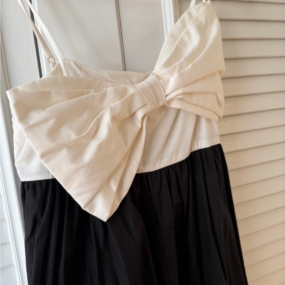Elegant Black and Cream Jumpsuit with Bow
